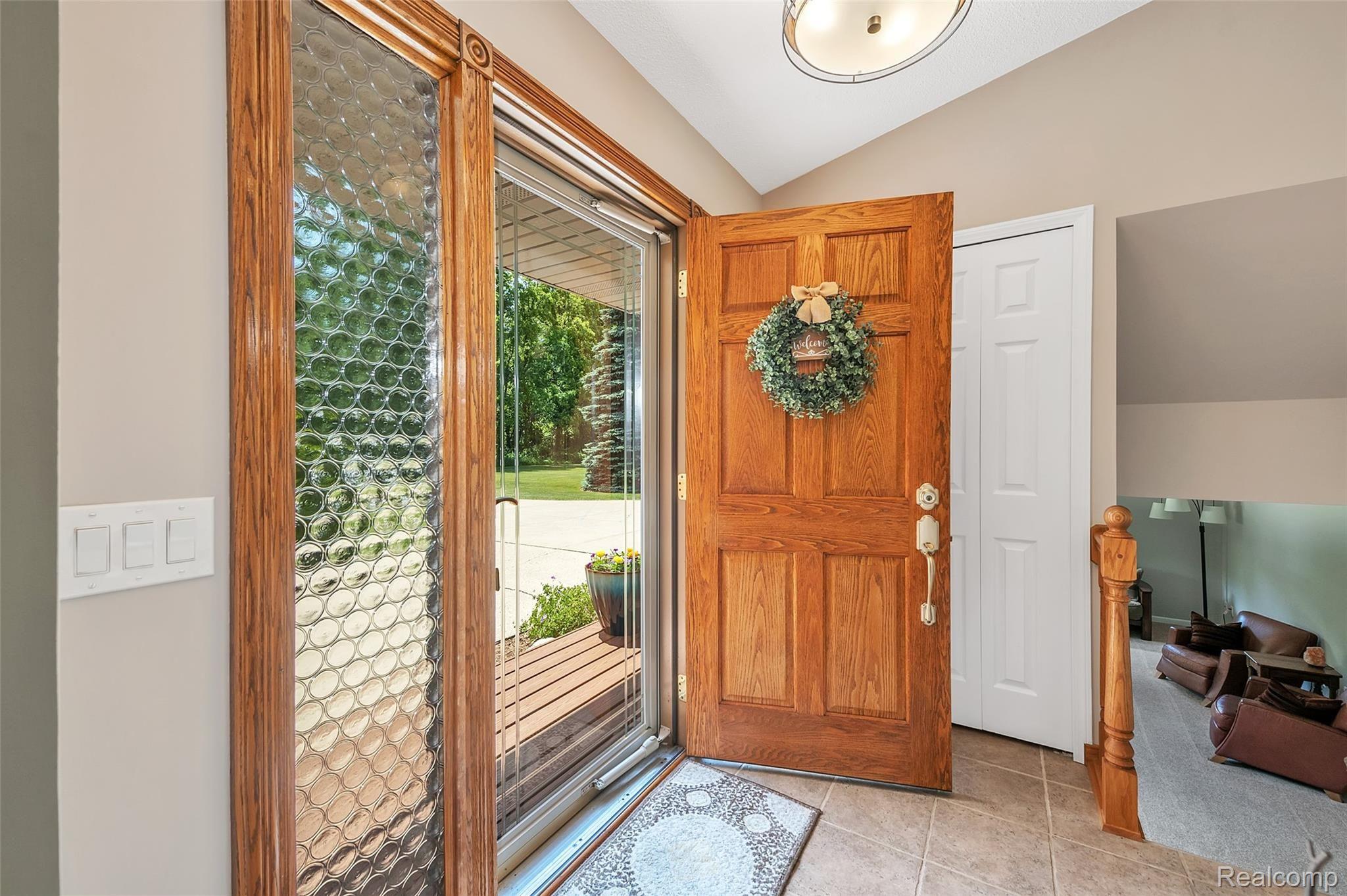 4054 Bennett Lake Road Fenton, MI 48430 - Photo 4 of 57 Welcome Home to 4054 Bennett Lake Road ~ Hardwood Door