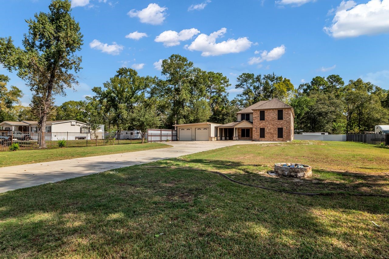 25171 Virginia Lane Porter, TX 77365 - Photo 3 of 39 Spacious yard