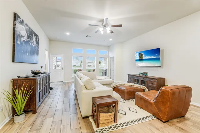 a kitchen with stainless steel appliances kitchen island granite countertop a sink and cabinets