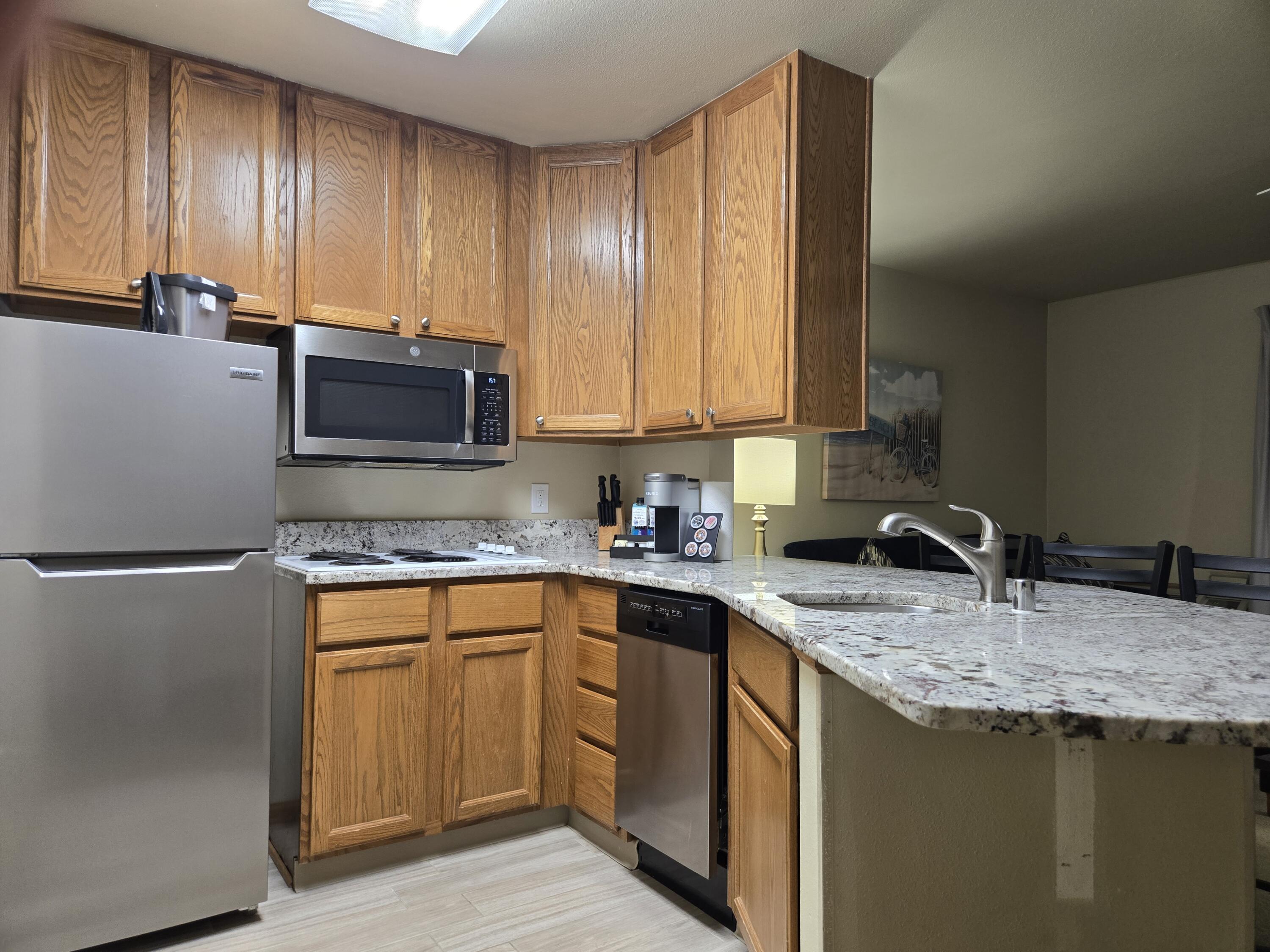 111 Center Street, Unit 237 Lake Geneva, WI 53147 - Photo 5 of 45 Fully Equipped Kitchen