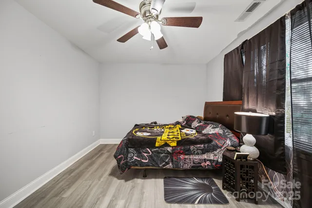 a en suite bathroom with a sink and a mirror