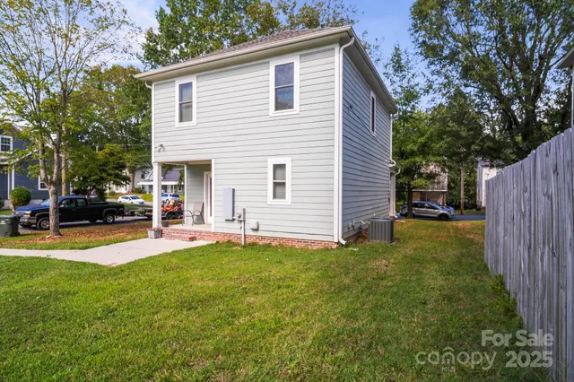 a view of a swimming pool with an outdoor space and seating area
