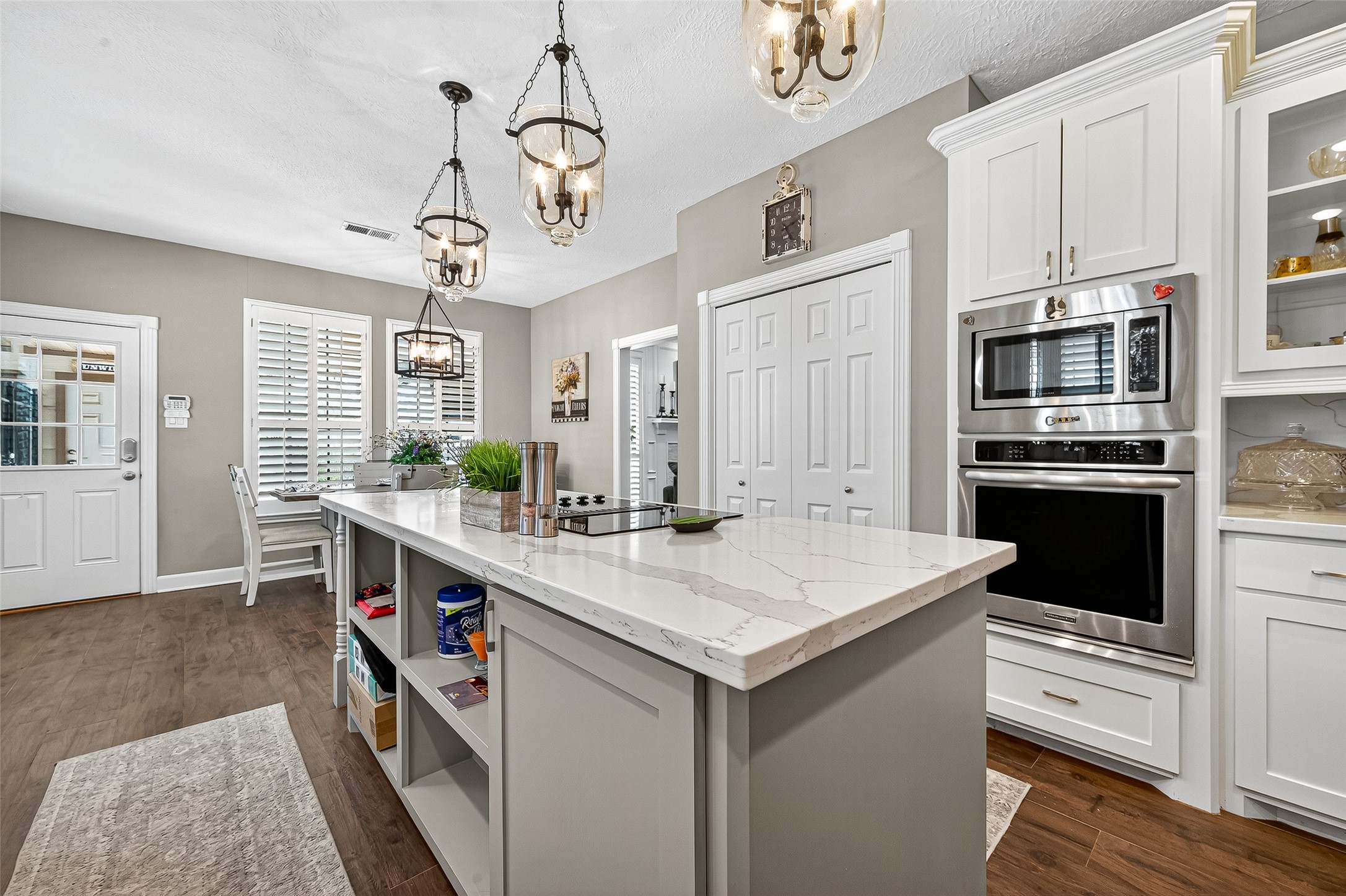 5911 Springton Lane Spring, TX 77379 - Photo 16 of 43 a kitchen with a stove a sink and a refrigerator