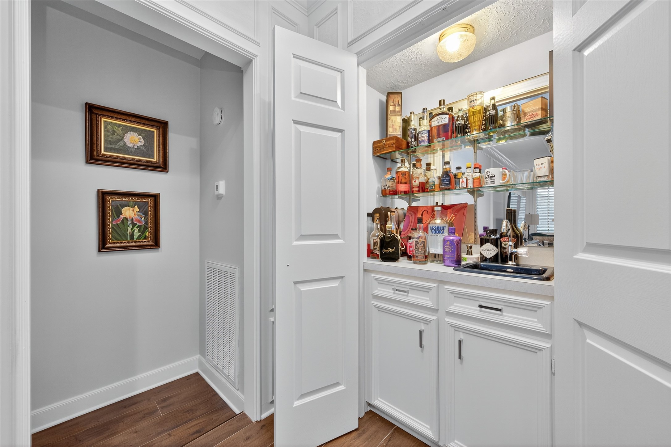 5911 Springton Lane Spring, TX 77379 - Photo 18 of 43 a view of a hallway with wooden floor and closet