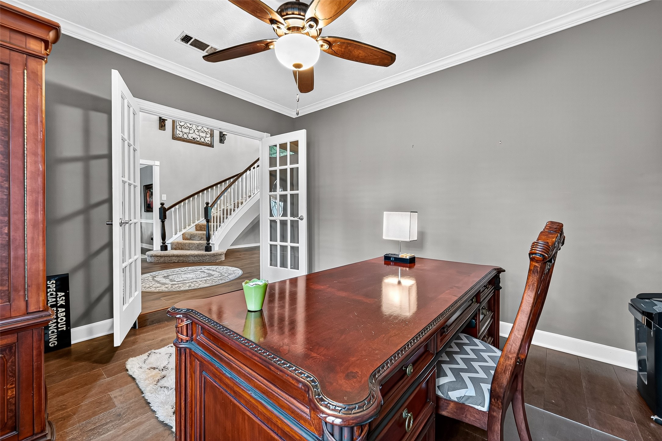 5911 Springton Lane Spring, TX 77379 - Photo 21 of 43 a dining room with furniture and wooden floor
