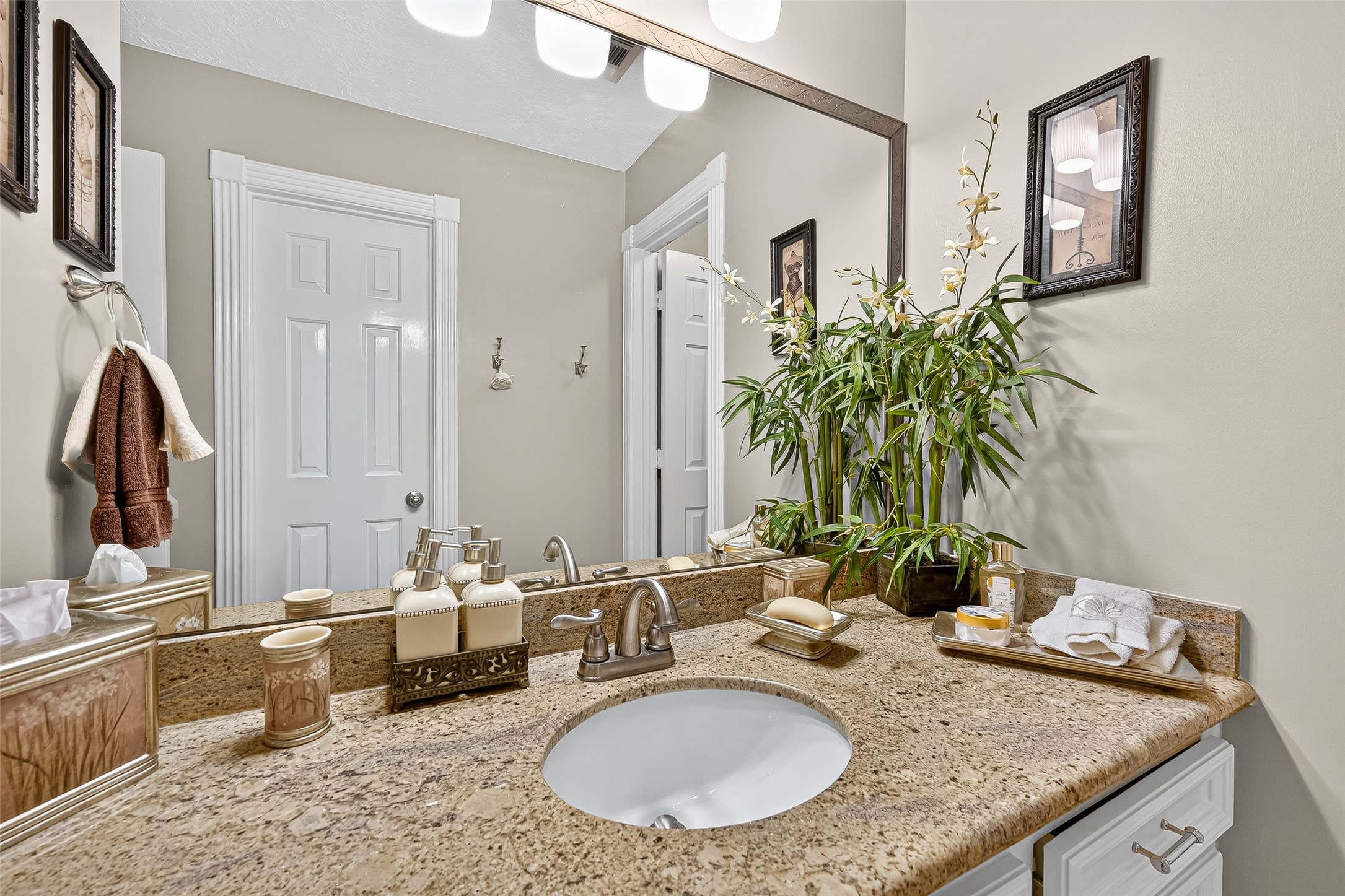 5911 Springton Lane Spring, TX 77379 - Photo 27 of 43 a bathroom with sink granite and a mirror