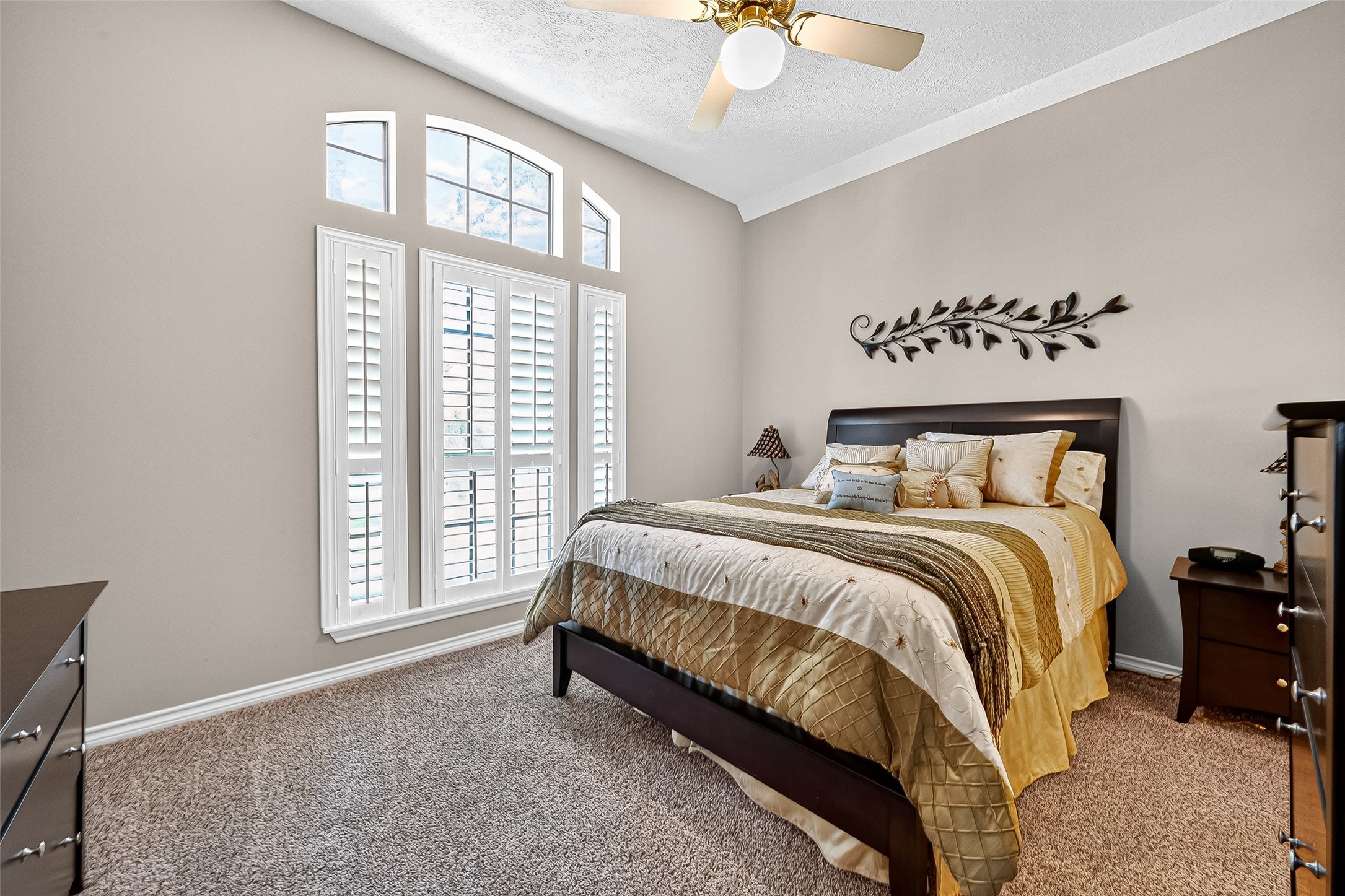 5911 Springton Lane Spring, TX 77379 - Photo 32 of 43 a spacious bedroom with a bed and a window