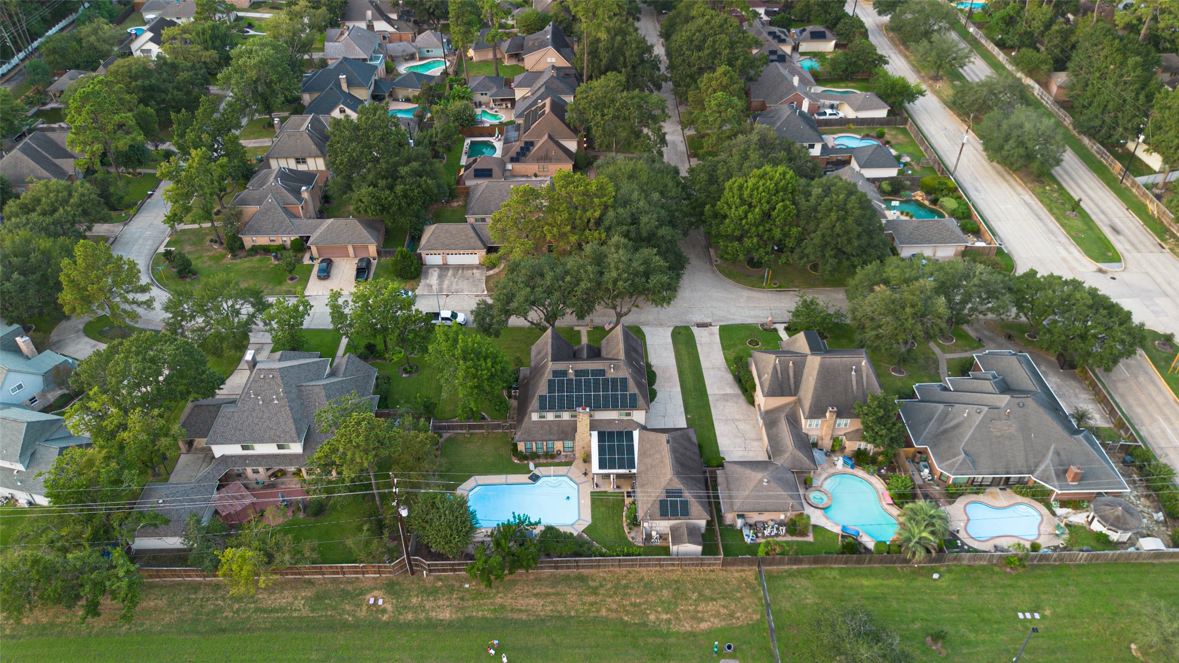 5911 Springton Lane Spring, TX 77379 - Photo 42 of 43 an aerial view of multiple houses with yard