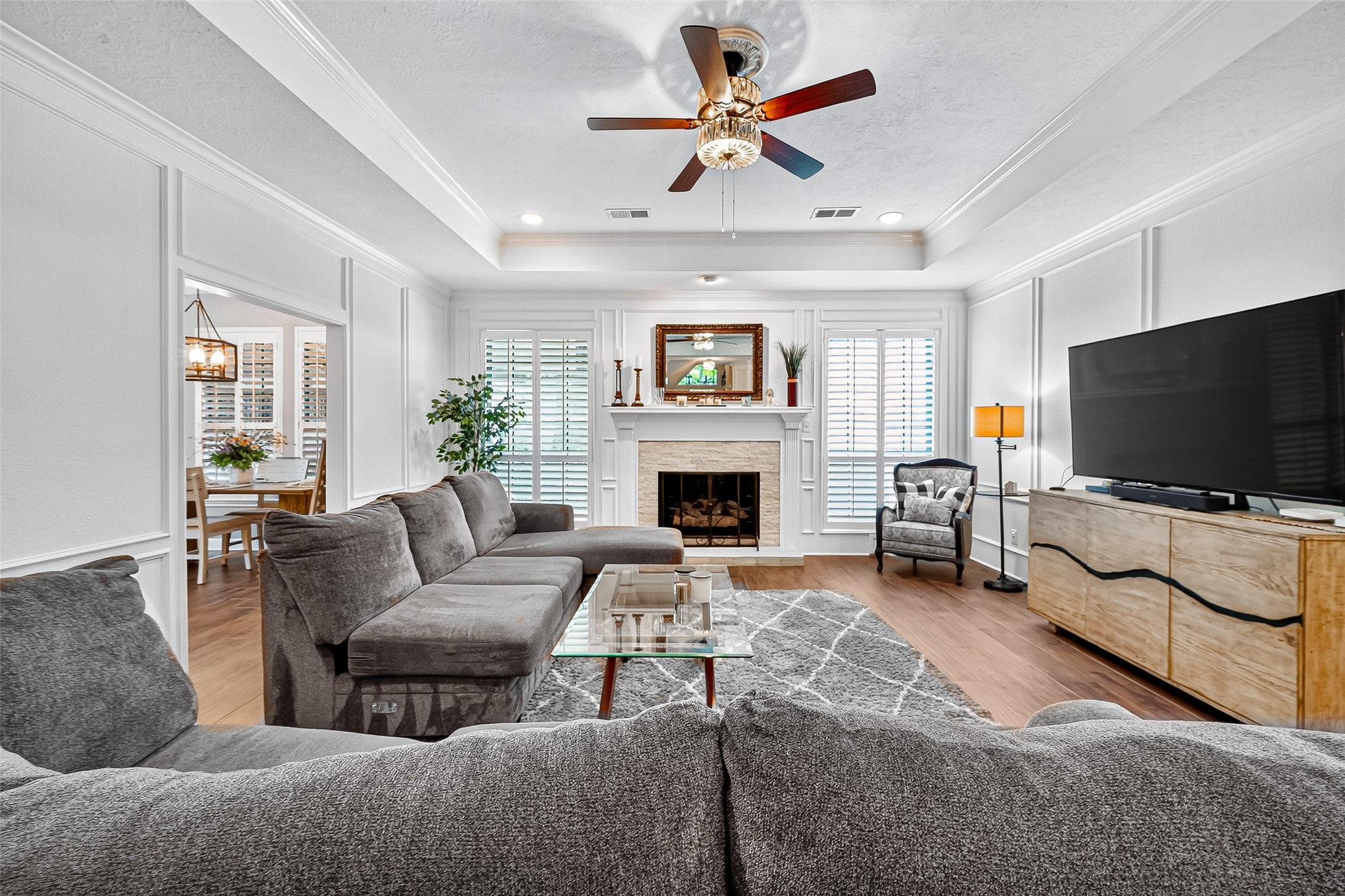 5911 Springton Lane Spring, TX 77379 - Photo 9 of 43 a living room with furniture and a flat screen tv