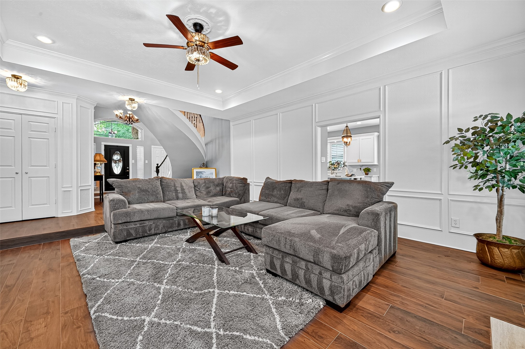 5911 Springton Lane Spring, TX 77379 - Photo 10 of 43 a living room with furniture and a chandelier