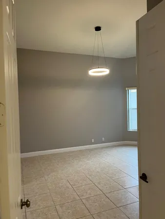 a view of an empty room with window