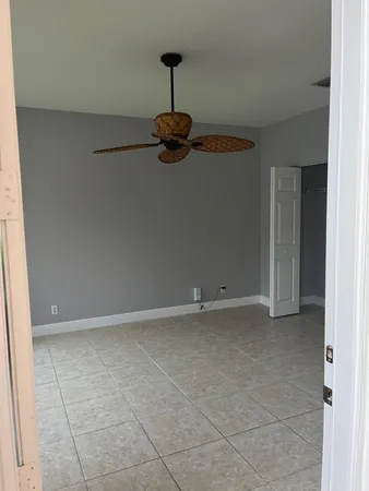 a bathroom with a shower and toilet