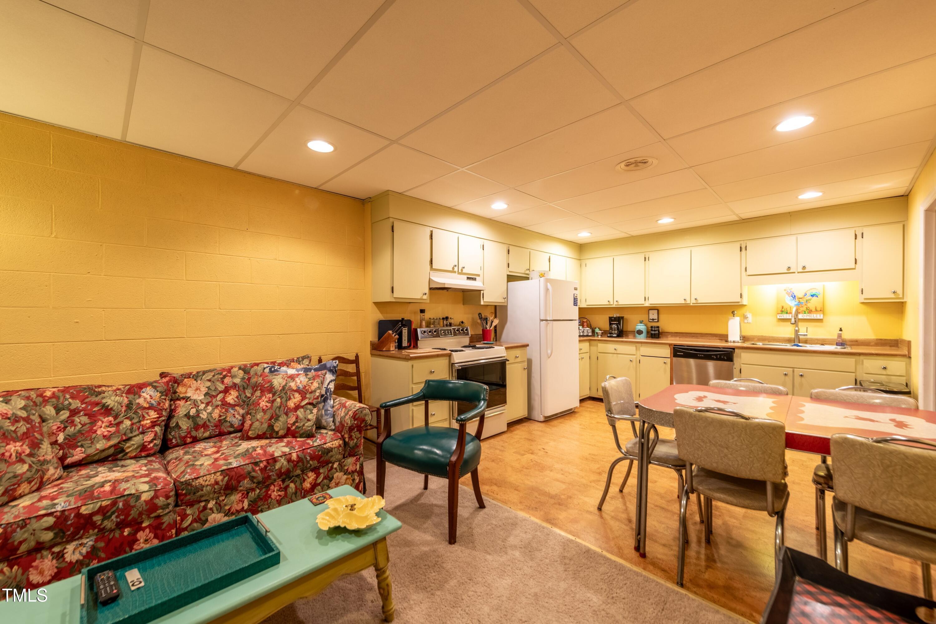 3201 Queens Road Raleigh, NC 27612 - Photo 62 of 75 Sitting room adjacent to basement kitchen