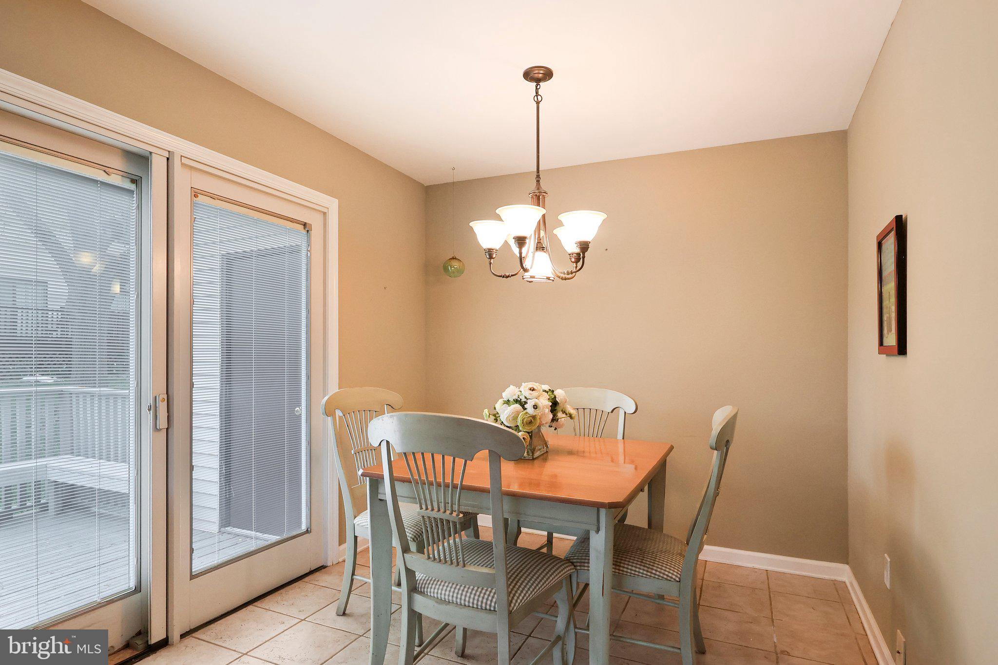 1 Balamor Lane Ewing, NJ 08628 - Photo 11 of 34 a view of a dining room with furniture wooden floor and a chandelier