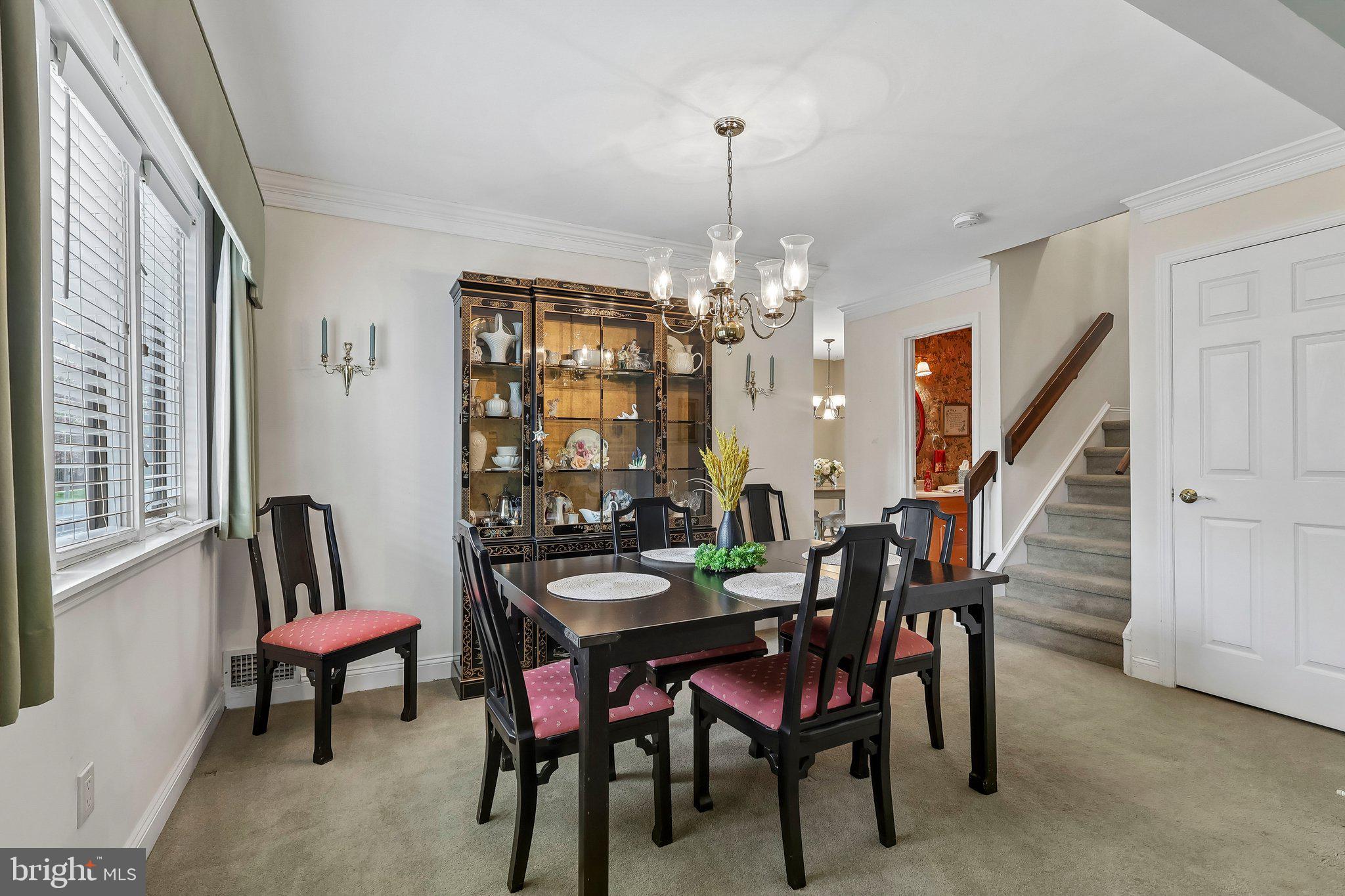 1 Balamor Lane Ewing, NJ 08628 - Photo 14 of 34 a view of a dining room with furniture and chandelier