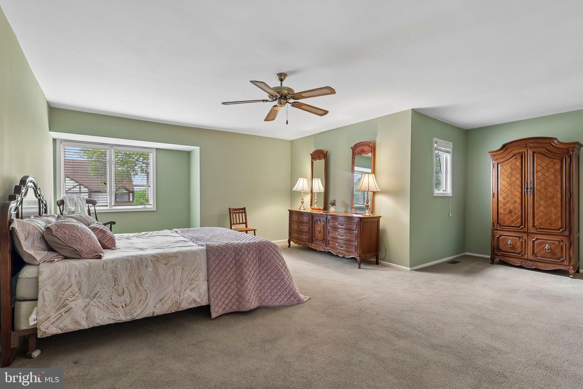 1 Balamor Lane Ewing, NJ 08628 - Photo 16 of 34 a living room with furniture and a ceiling fan