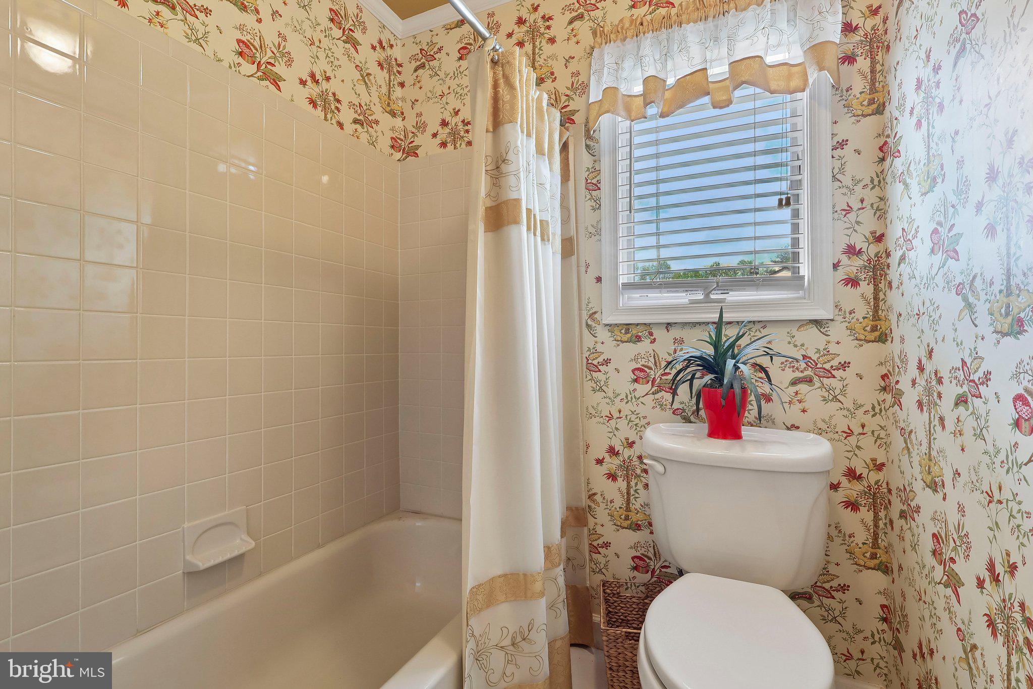 1 Balamor Lane Ewing, NJ 08628 - Photo 22 of 34 a white toilet sitting next to a bath tub