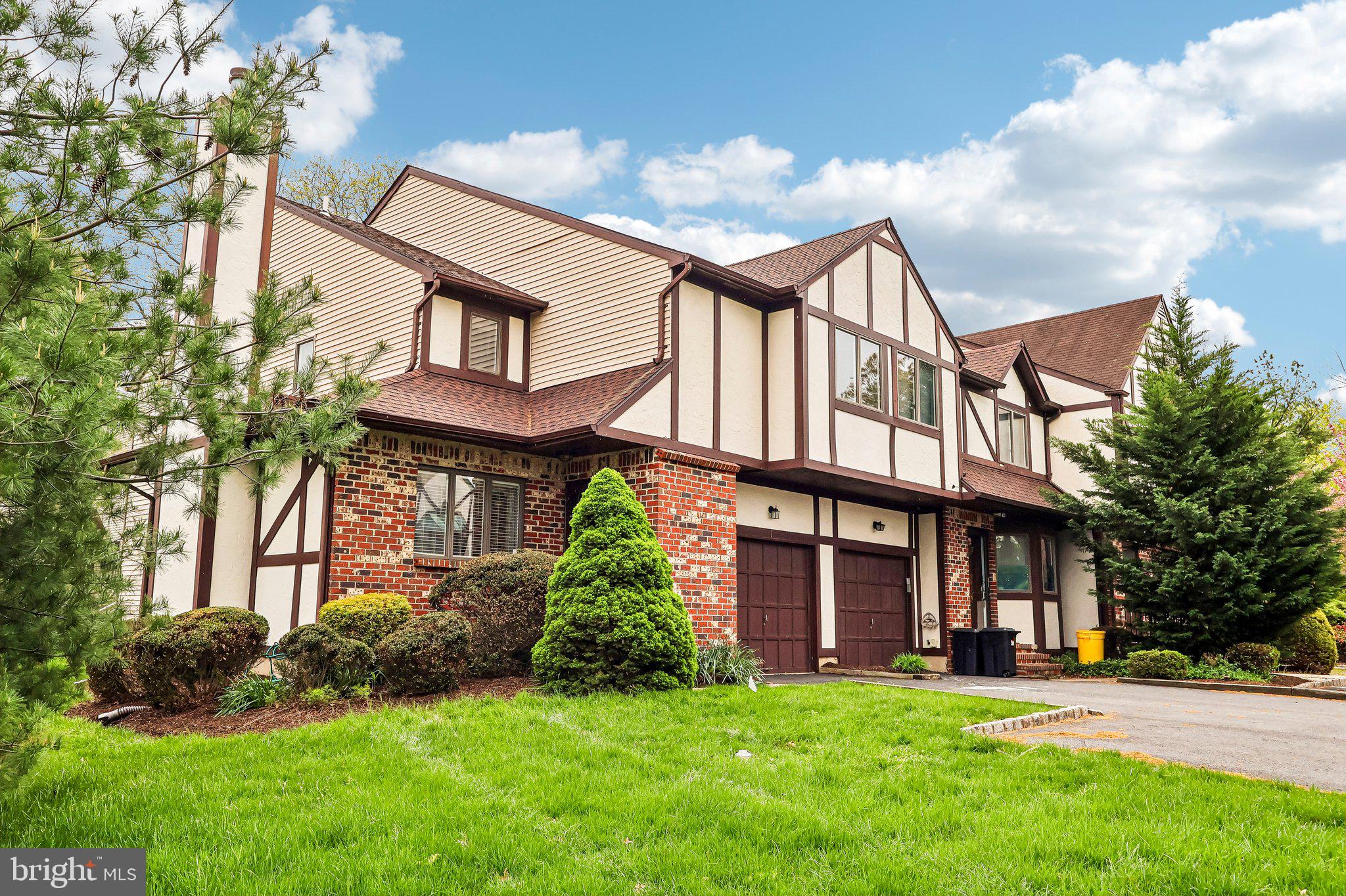 1 Balamor Lane Ewing, NJ 08628 - Photo 5 of 34 front view of a brick house with a yard