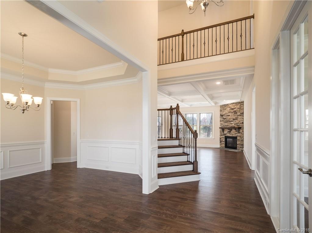2222 Watermark Point Place Fort Mill, SC 29708 - Photo 4 of 24 a view of a hallway with wooden floor and entryway
