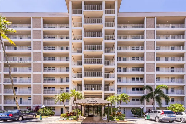 a front view of a building with a street