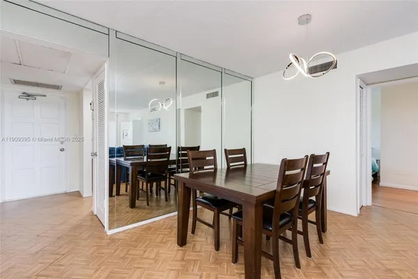 a view of a dining room with furniture