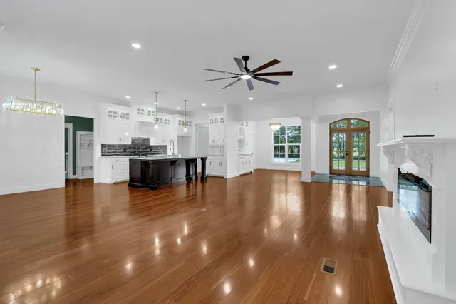 a bathroom with double sink and a mirror