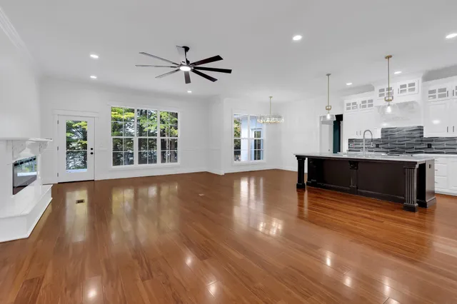 a kitchen with stainless steel appliances a sink and a stove