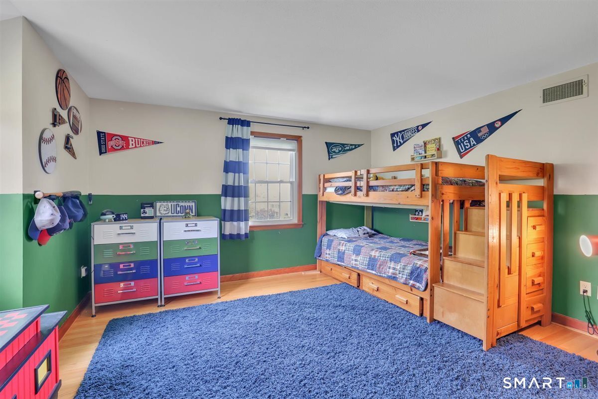 72 Old Post Road Wethersfield, CT 06109 - Photo 25 of 40 a bedroom with bunk bed and a window