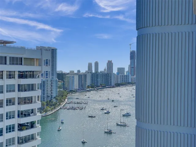 a view of roof with city view