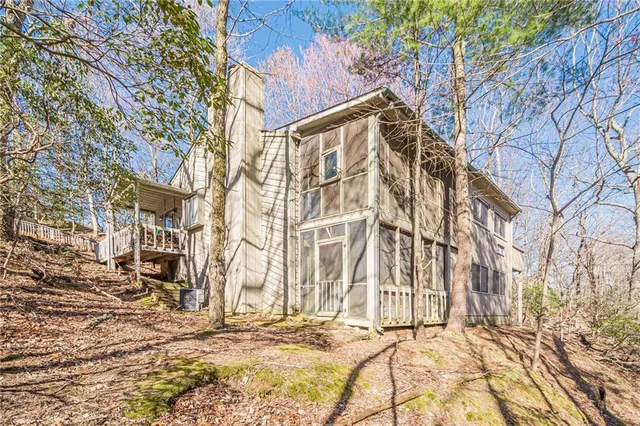 a view of a backyard of the house