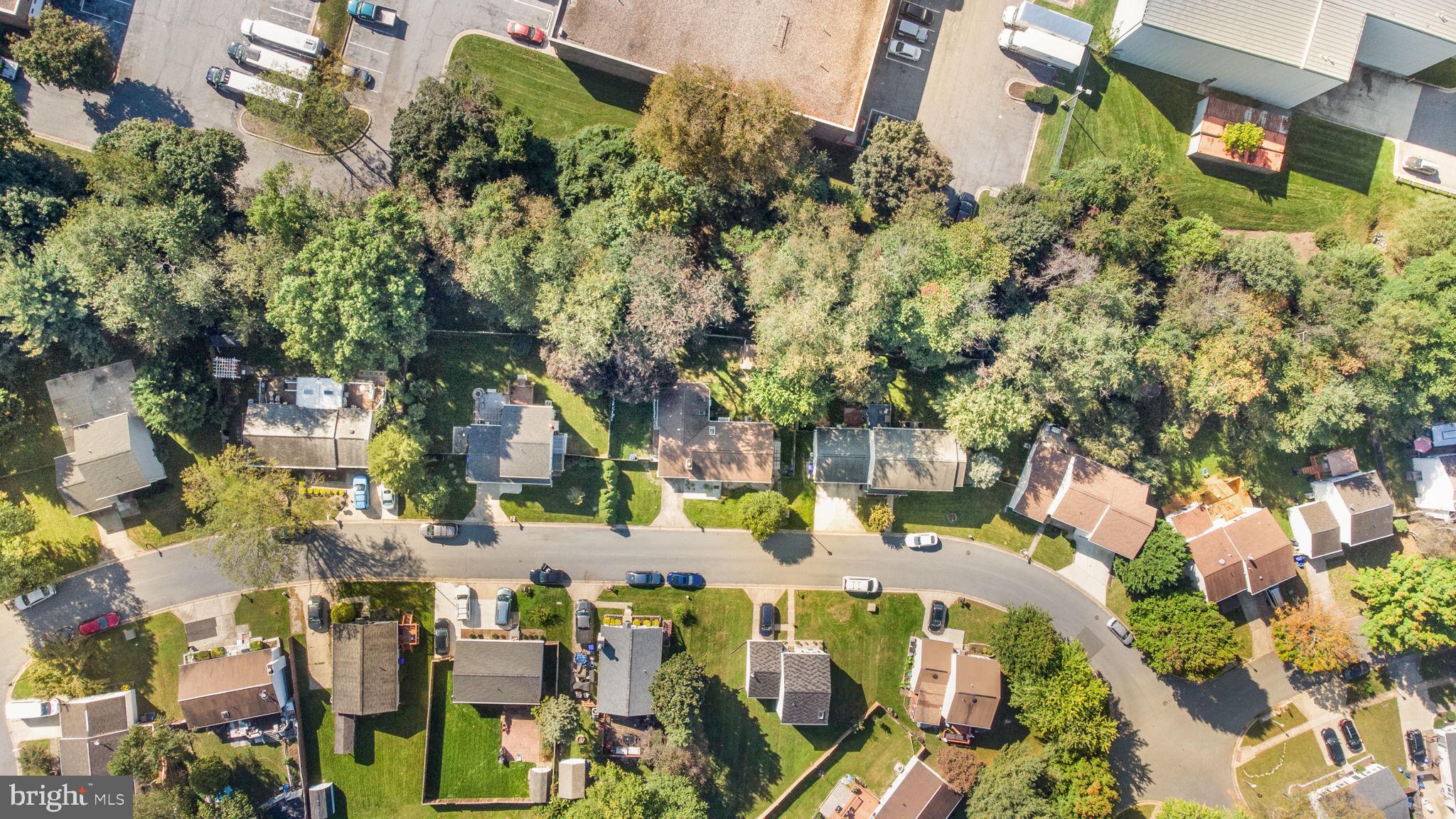 7316 Torran Rocks Way Gaithersburg, MD 20879 - Photo 5 of 17 an aerial view of residential houses with outdoor space