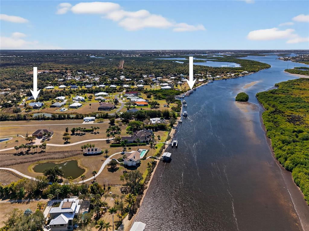 28991 Smugglers Lane Punta Gorda, FL 33982 - Photo 2 of 67 an aerial view of a house with a yard