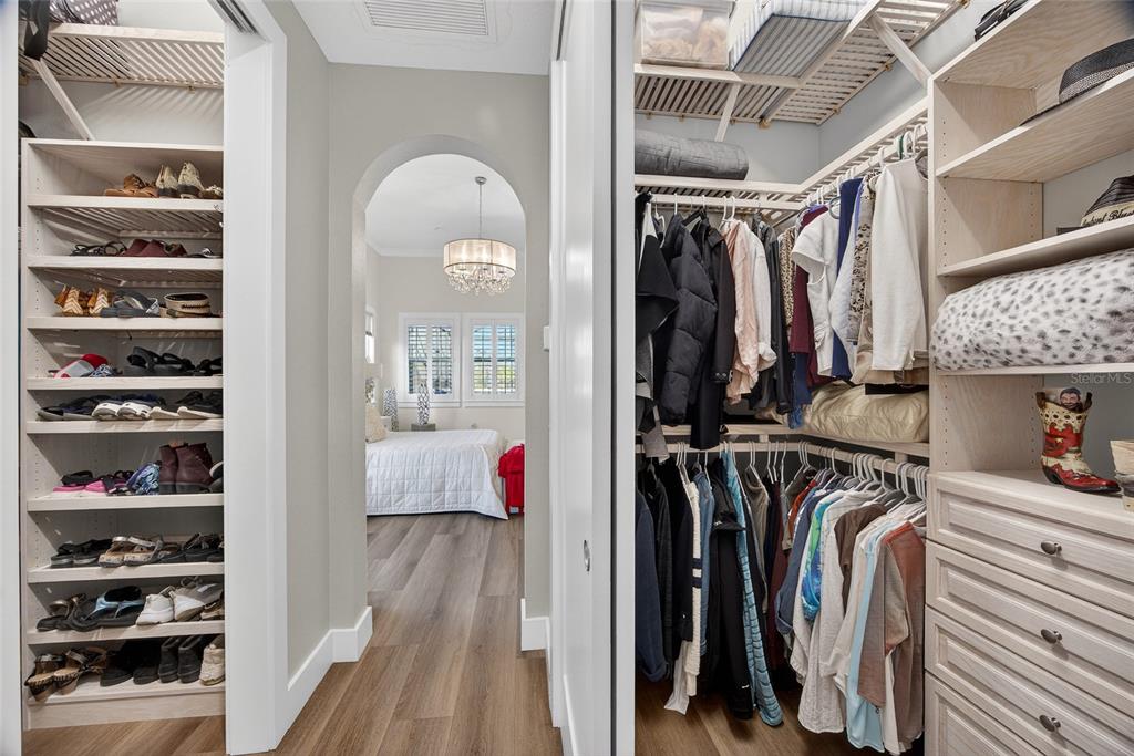 28991 Smugglers Lane Punta Gorda, FL 33982 - Photo 24 of 67 a view of walk in closet with clothes and shoes