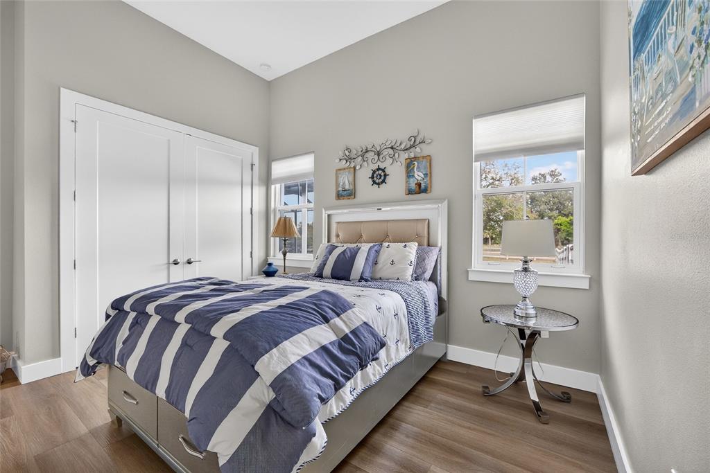 28991 Smugglers Lane Punta Gorda, FL 33982 - Photo 31 of 67 a bedroom with a bed and a table