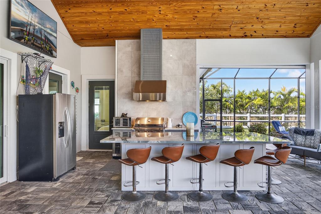 28991 Smugglers Lane Punta Gorda, FL 33982 - Photo 36 of 67 a outdoor space with chairs