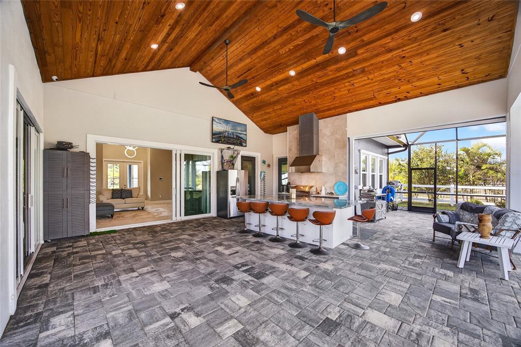 28991 Smugglers Lane Punta Gorda, FL 33982 - Photo 37 of 67 a view of a house with furniture and floor to ceiling window