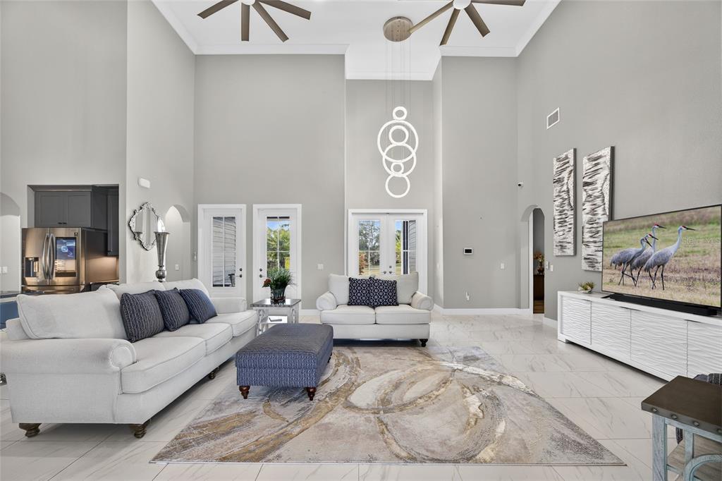 28991 Smugglers Lane Punta Gorda, FL 33982 - Photo 6 of 67 a living room with furniture and a large window