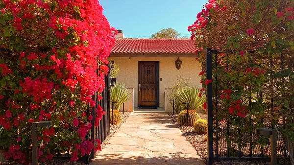 a front view of a house with a porch