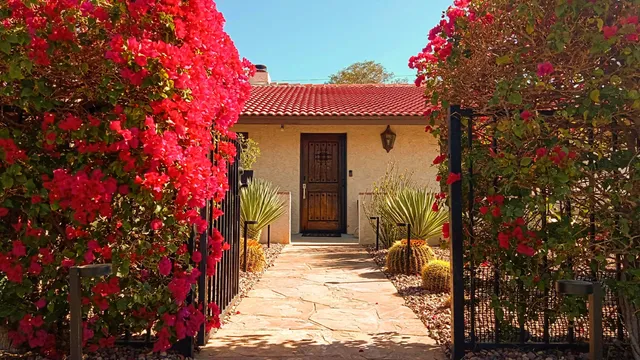 a front view of house with outdoor seating