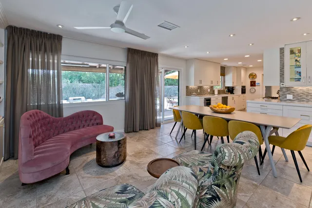 a outdoor living space with furniture and city view