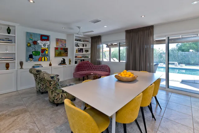 a view of a tree in a yard