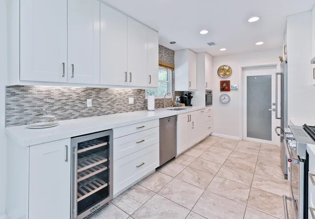 a swimming pool with outdoor seating and yard