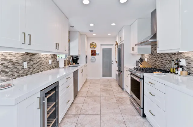 a view of a palm plant with a tree