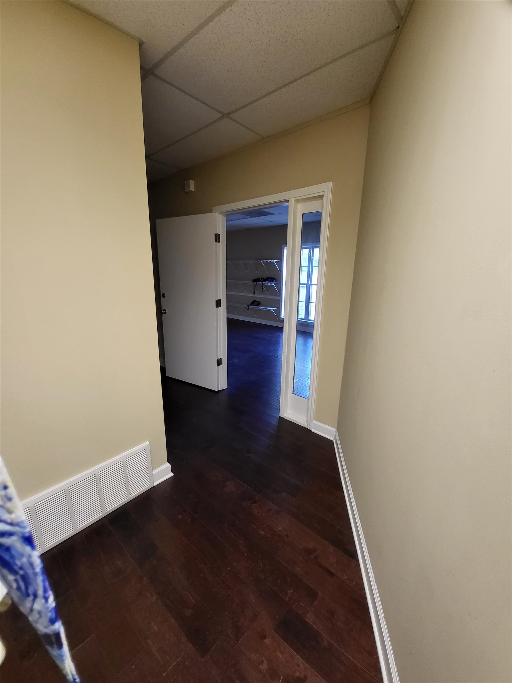 811 Timber Creek Drive, Unit SUITE 817 Memphis, TN 38018 - Photo 11 of 14 an empty room with wooden floor and closet