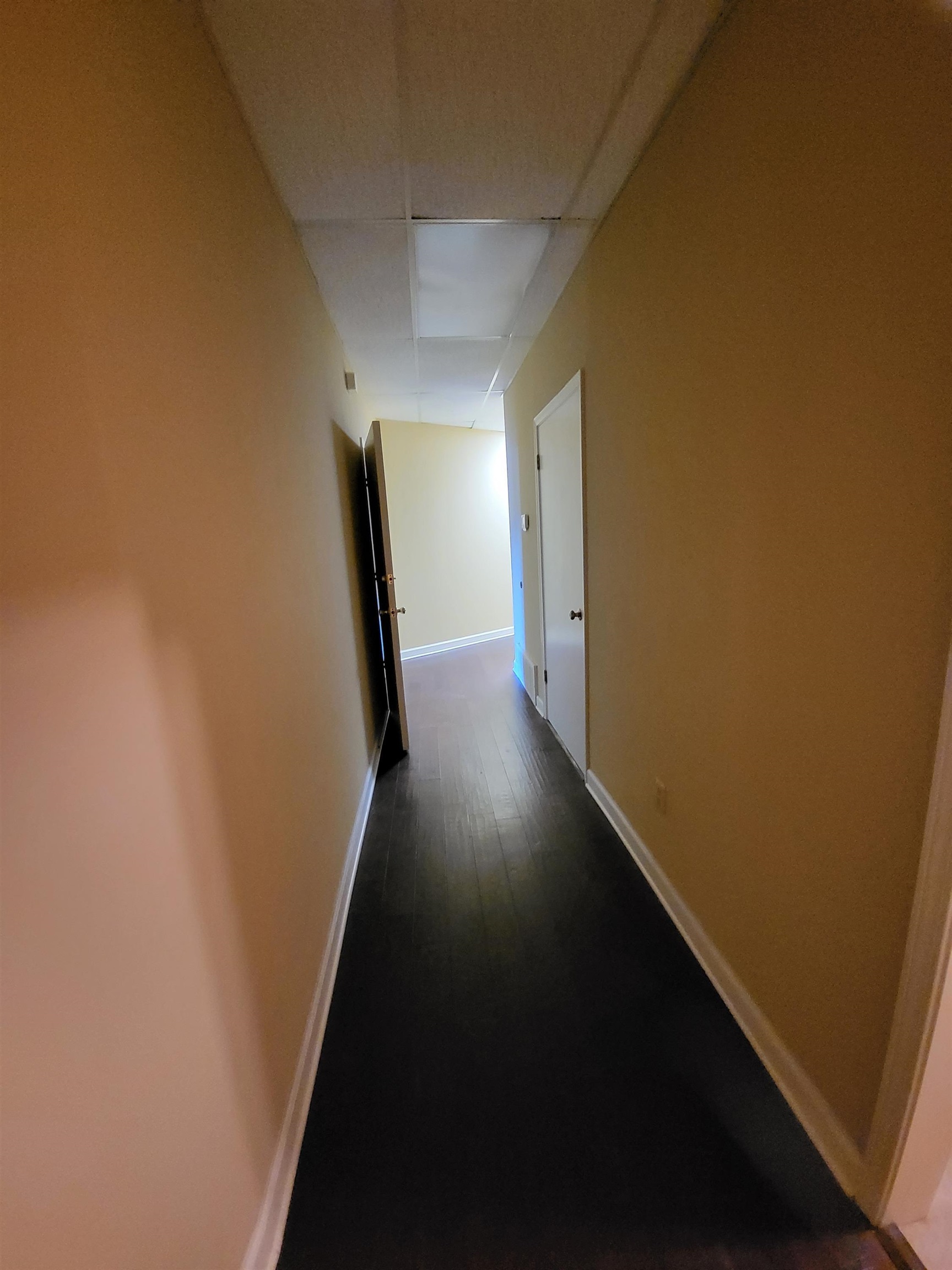811 Timber Creek Drive, Unit SUITE 817 Memphis, TN 38018 - Photo 12 of 14 a view of a hallway with wooden floor