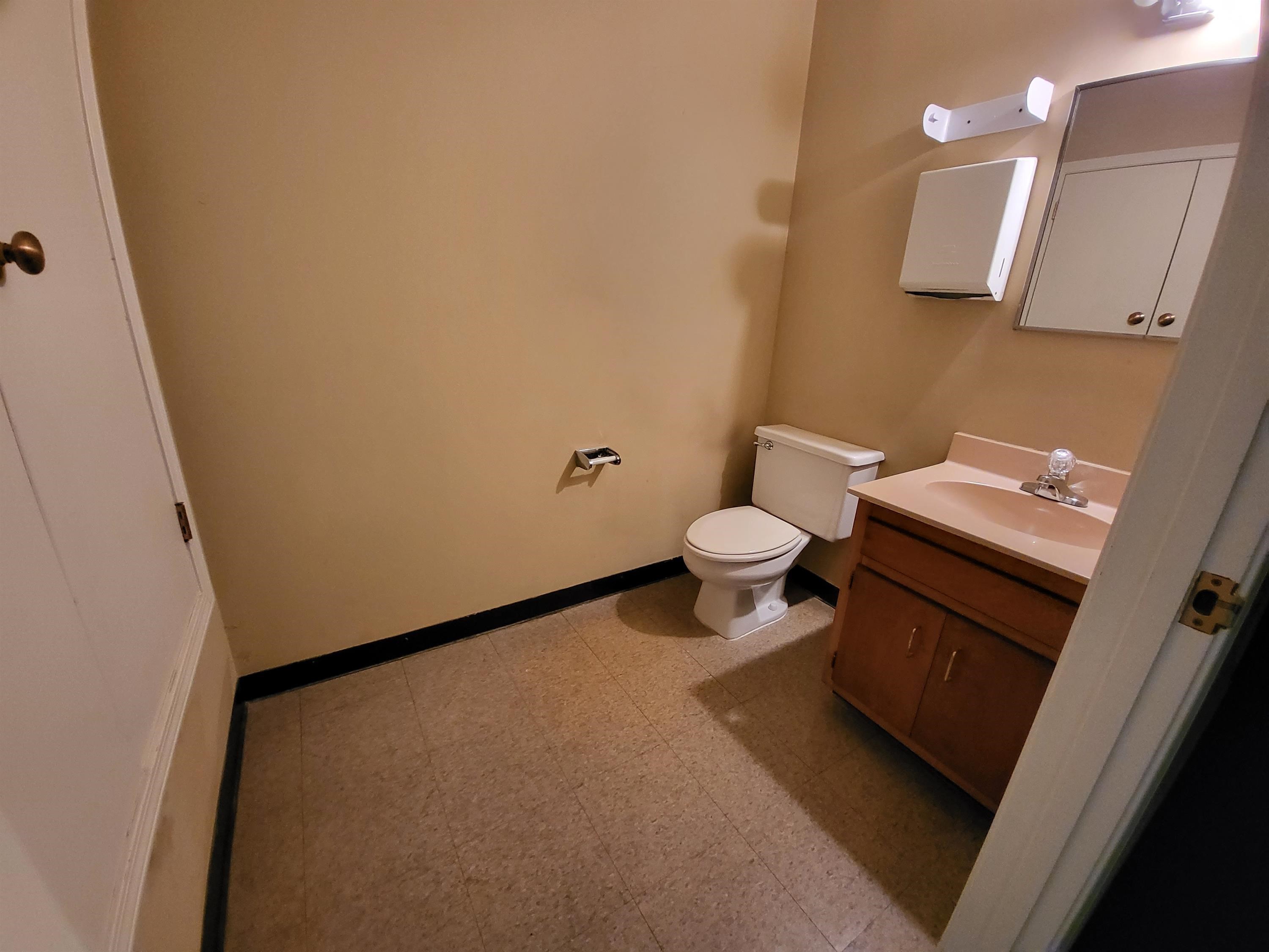 811 Timber Creek Drive, Unit SUITE 817 Memphis, TN 38018 - Photo 13 of 14 a bathroom with a sink and a toilet