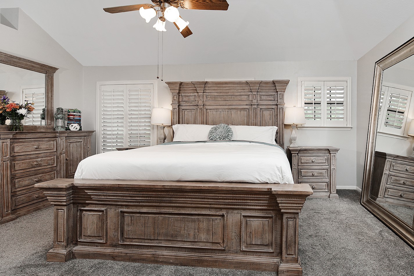 2619 Knollbrook Lane Spring, TX 77373 - Photo 16 of 27 a spacious bedroom with a bed and a flat screen tv