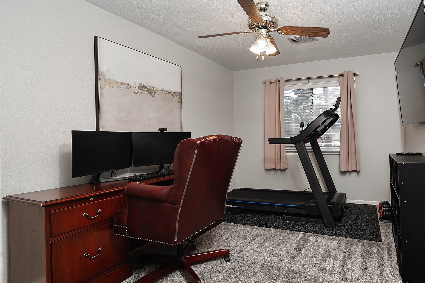 2619 Knollbrook Lane Spring, TX 77373 - Photo 21 of 27 a living room with furniture and a flat screen tv