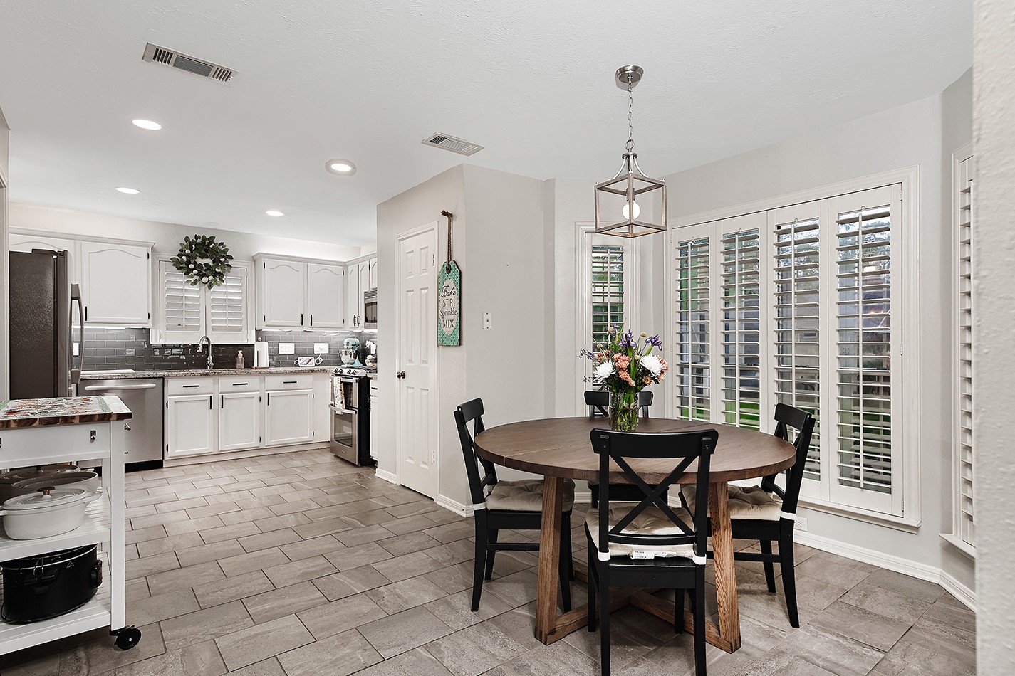 2619 Knollbrook Lane Spring, TX 77373 - Photo 10 of 27 a dining room with furniture and window