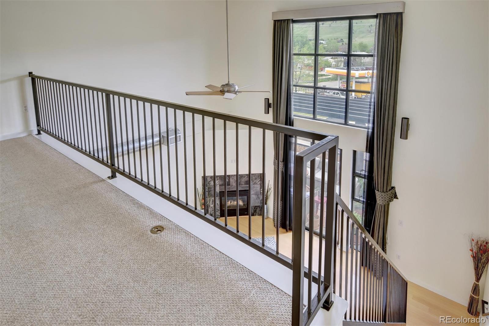 4520 Broadway, Unit 210 Boulder, CO 80304 - Photo 14 of 36 a view of staircase with rug floor